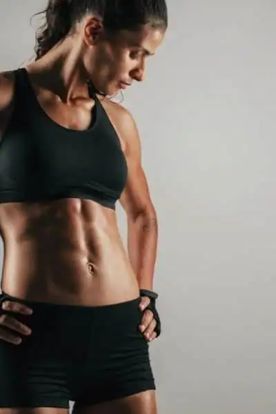 Toning Up at Home: The Ultimate Guide to Bodyweight Exercises 2 Image of woman's toned stomach after bodyweight exercises Isle of Isla and non-surgical treatment from Lipo 360