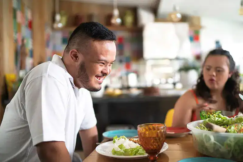 Empowering Weight Loss: A Comprehensive Guide for Individuals with Disabilities 2 Image of a disabled man and balance around nutrition to aid weight loss Isle of Isla