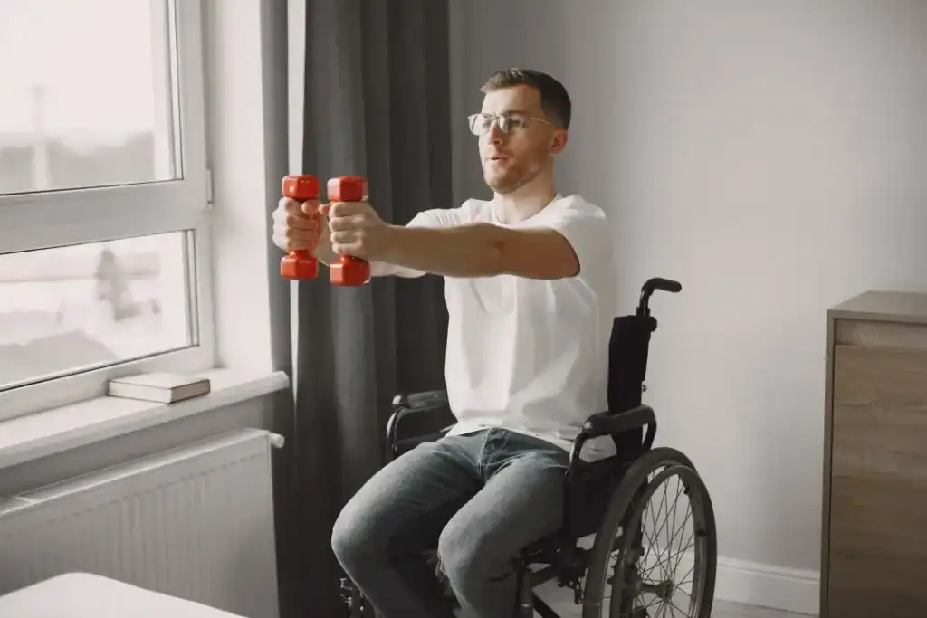 Image of man doing exercise in his wheelchair to aid weight loss Isle of Isla