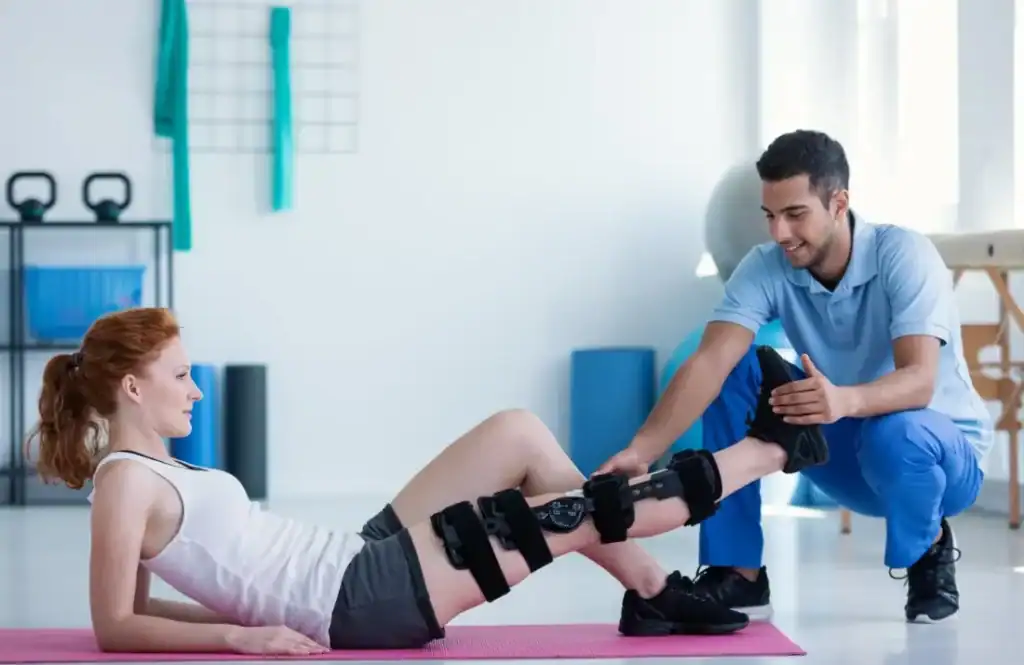 Debunking Meal Timing Myths: The Truth About Muscle Recovery 1 Woman having treatment to help muscle recovery Isle of Isla after an injury