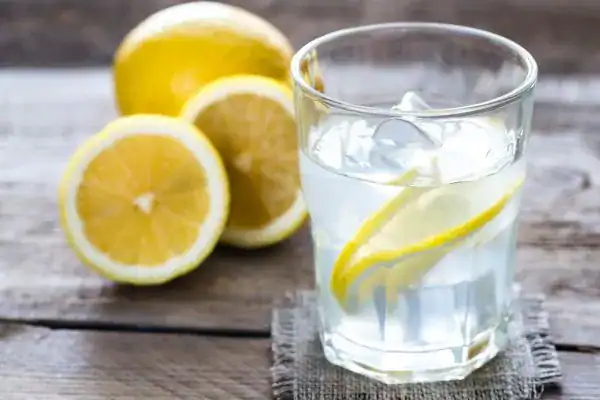 Hydration: The Secret Ingredient for a Toned Stomach and Enhanced Fitness 2 Image of lemon water to aid hydration Isle of Isla