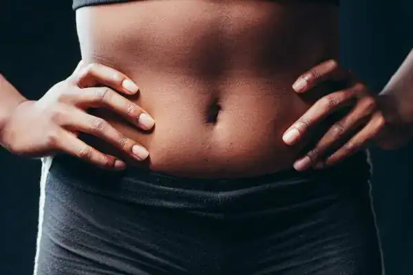Toning Your Stomach: The Ultimate Guide to Achieving a Sculpted Stomach While Shedding Pounds 1 Image of a toned stomach after non surgical treatment Isle of Isla